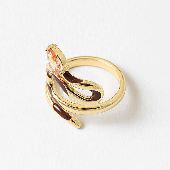 18k gold-filled waterproof serpent ring, hand-painted with enamel and finished with a cubic zirconia. A symbol of rebirth, intuition, power, and protection.