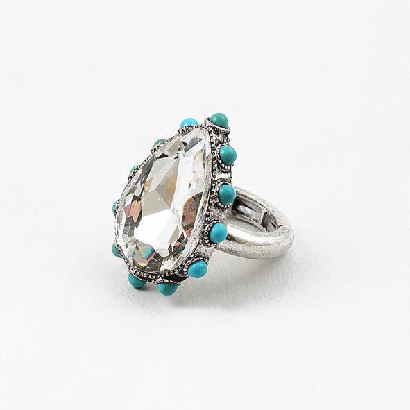 Bold stainless steel ring with a zirconia center, genuine turquoise accents, and a comfortable stretch fit.

Adjustable ring