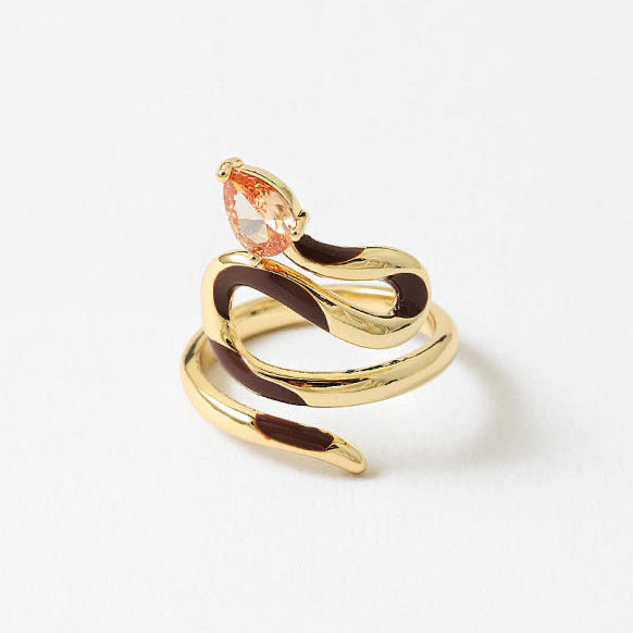 18k gold-filled waterproof serpent ring, hand-painted with enamel and finished with a cubic zirconia. A symbol of rebirth, intuition, power, and protection.